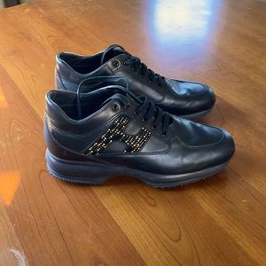 Black leather embellished sneakers